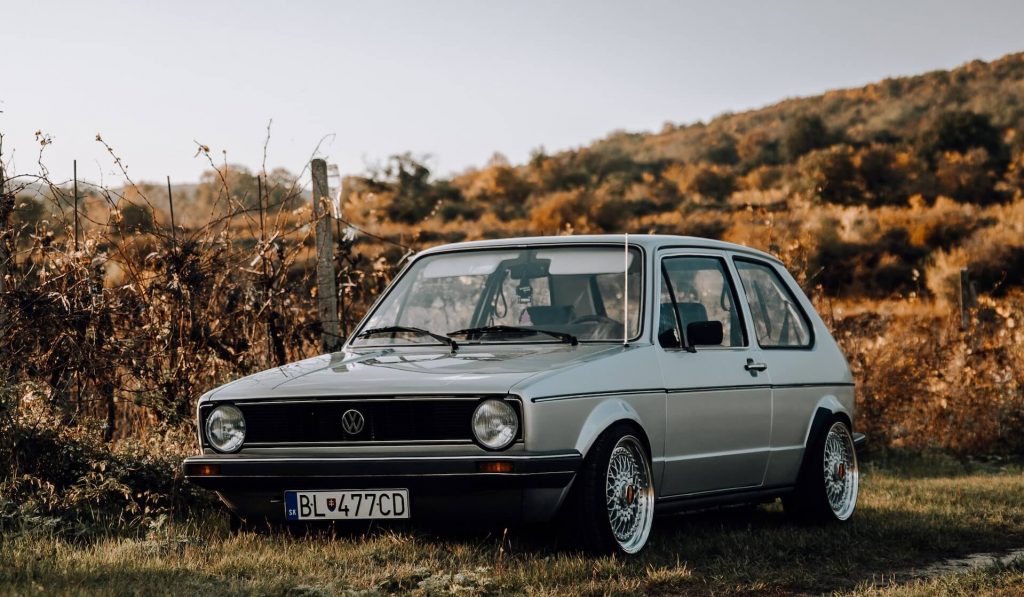Old Volkswagen Golf, a classic hatchback known for its reliability and performance.